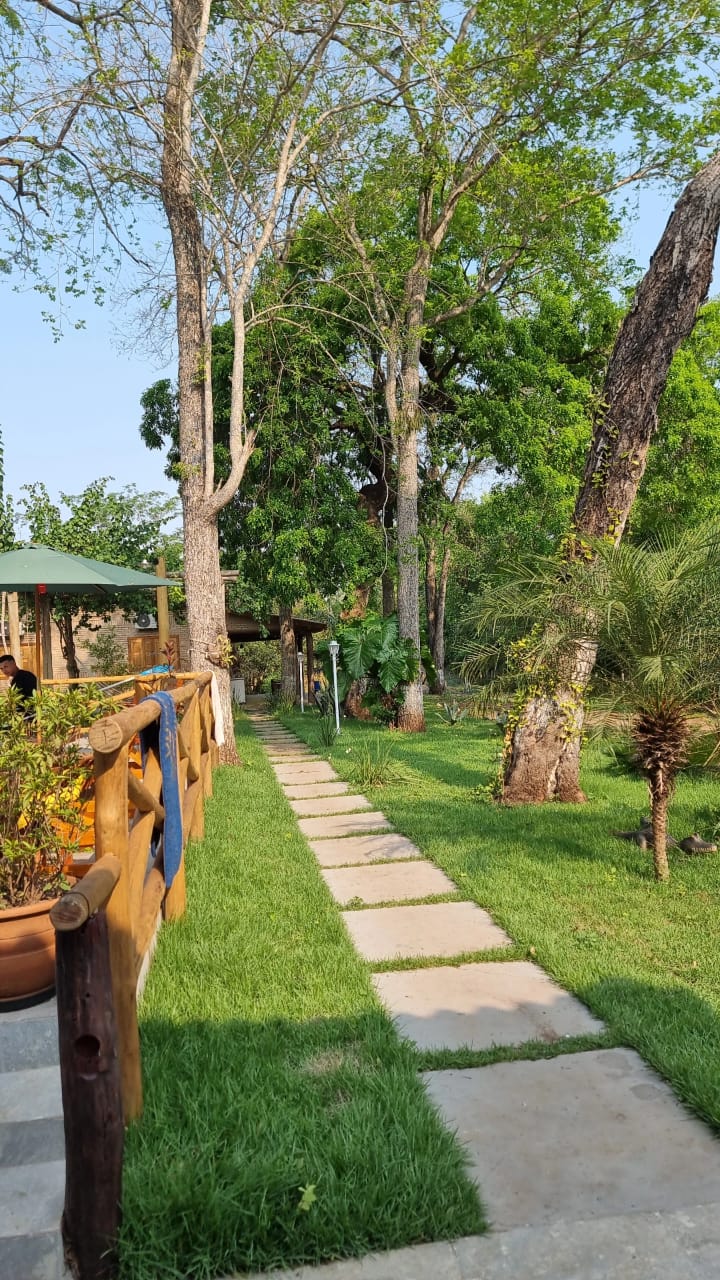 Área comum e piscina da Pousada do Cobrinha